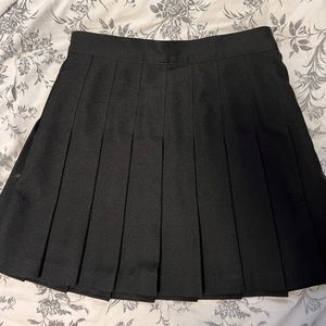 Black pleated tennis mini skirt